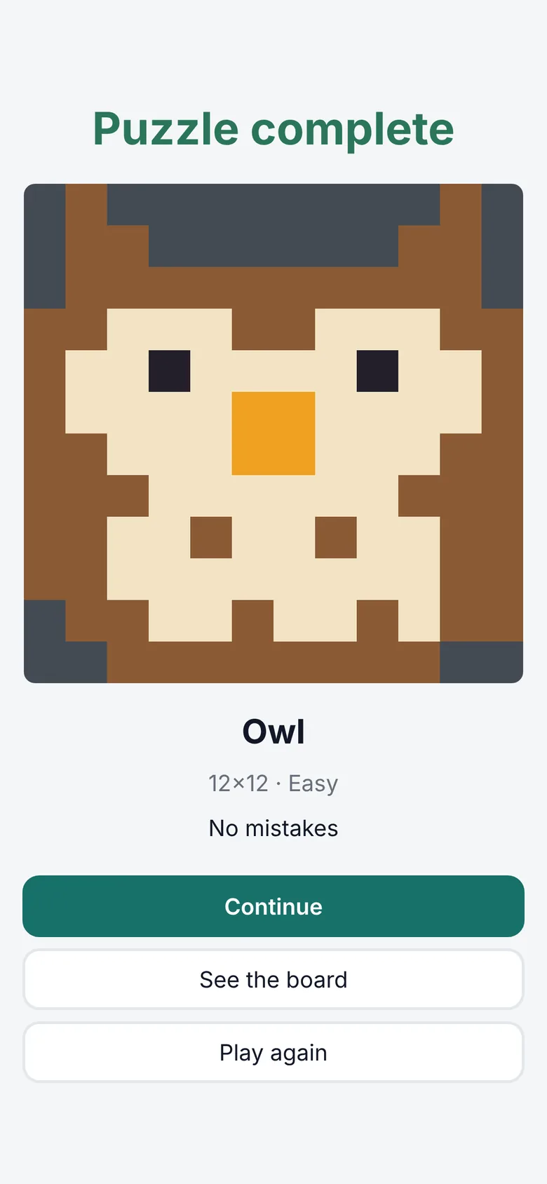 The finished owl picture with Puzzle complete above it.